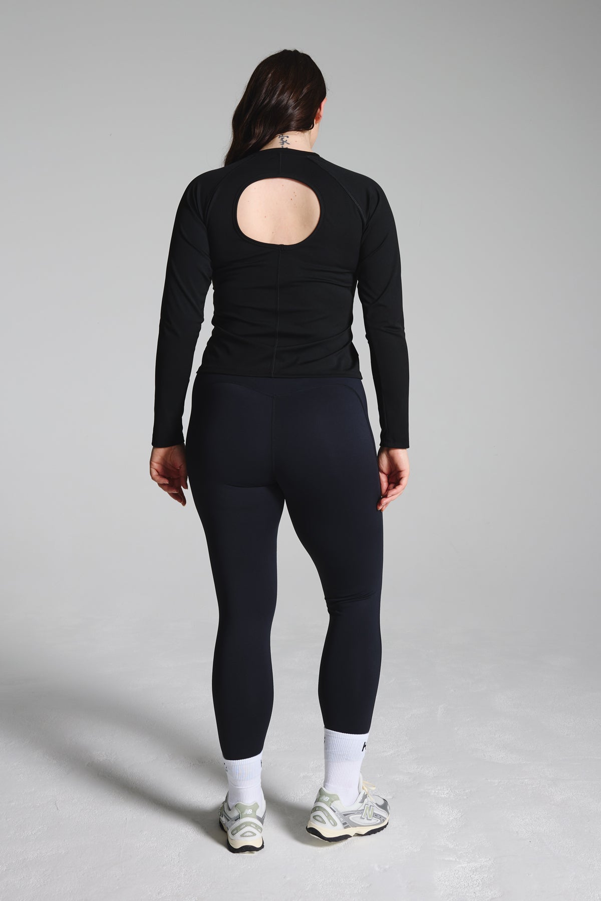 Black Long Sleeve Performance Top With Cut Out Back
